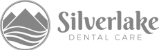 Logo of Silverlake Dental Care with a stylized lake and mountain silhouette